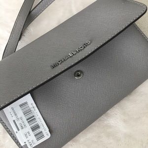 NWT Michael Kors wallet crossbody. Make offer